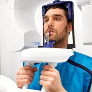 a man getting a CBCT scan